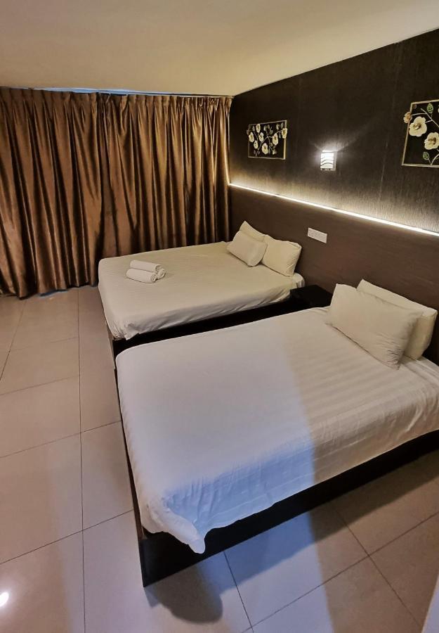 One Point Hotel Кучинг Екстериор снимка