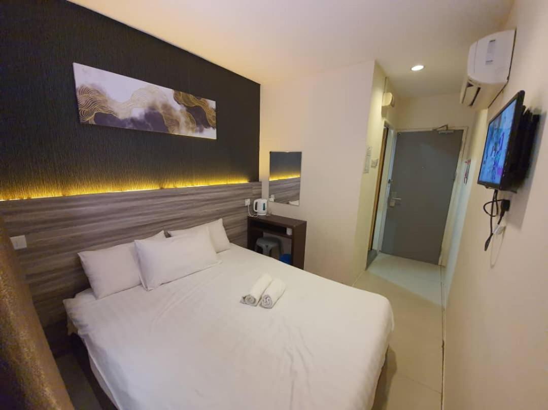 One Point Hotel Кучинг Екстериор снимка