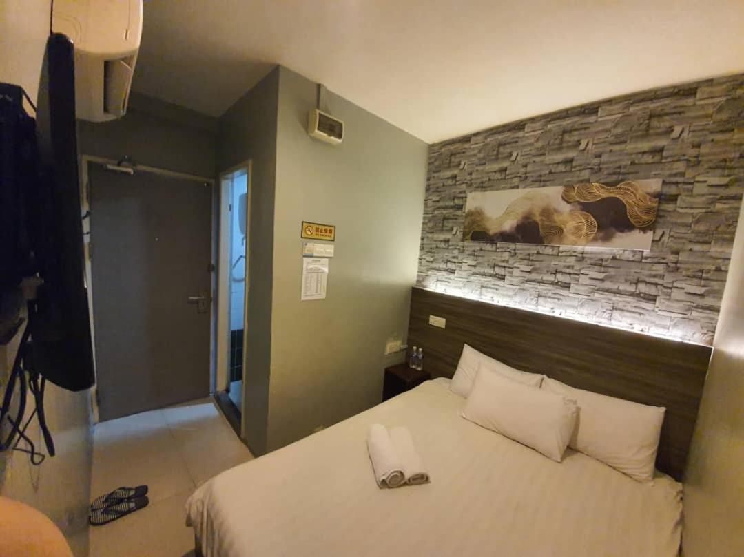 One Point Hotel Кучинг Екстериор снимка
