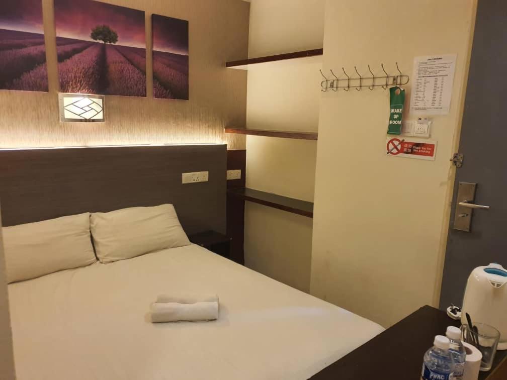 One Point Hotel Кучинг Екстериор снимка