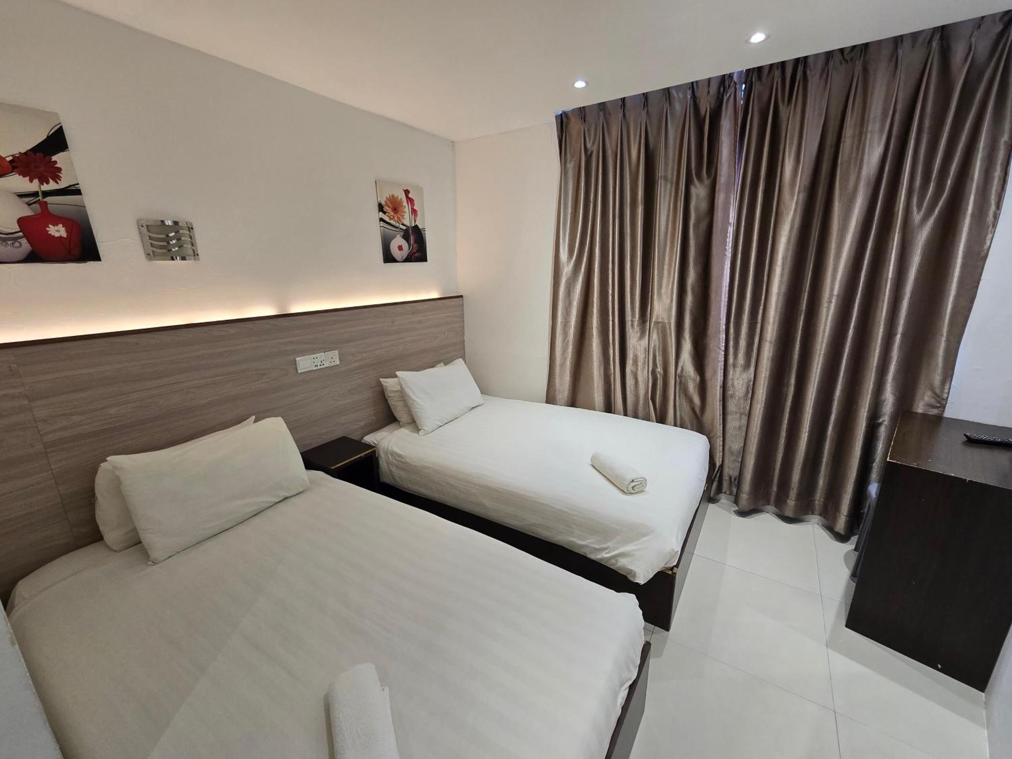 One Point Hotel Кучинг Екстериор снимка